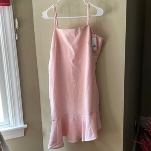 Light pink strapless BCBG dress. Never worn tags still on dress